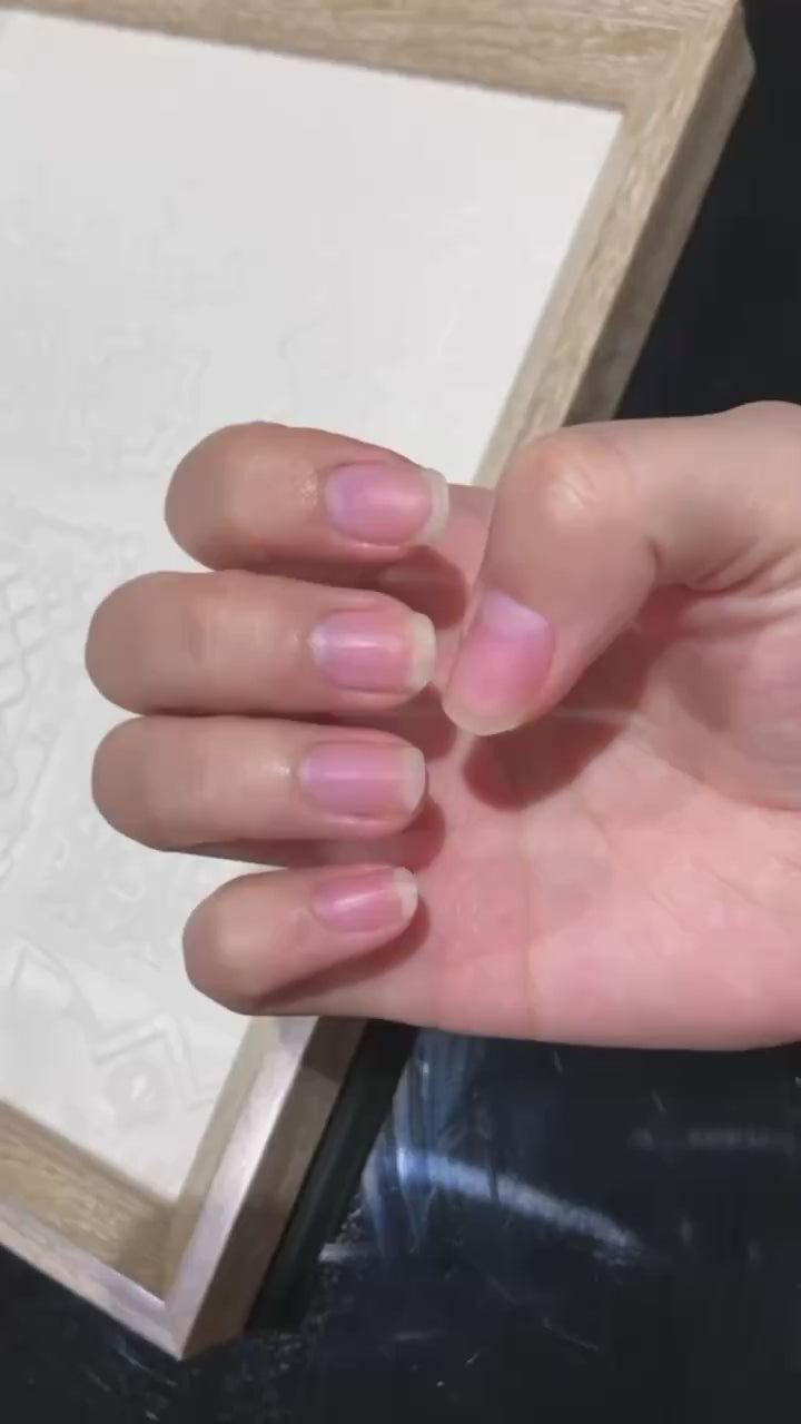 Load video: How to apply press-on nails.